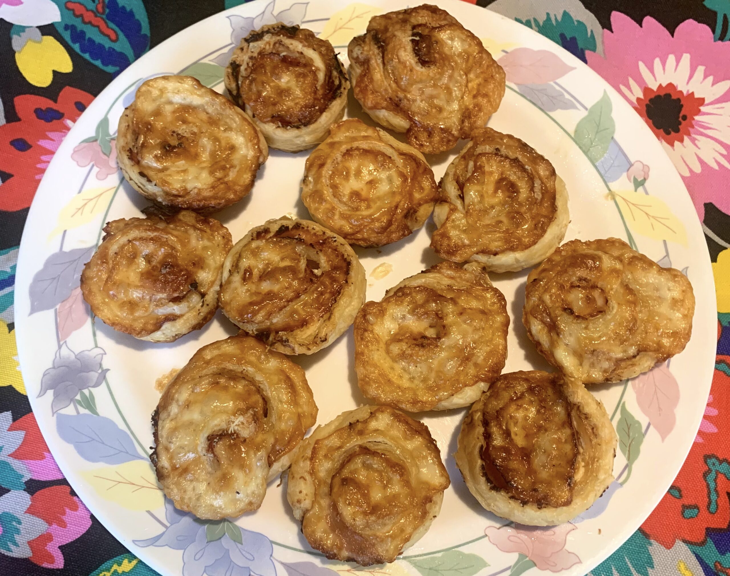 Pastry roses with cooked ham and provolone cheese