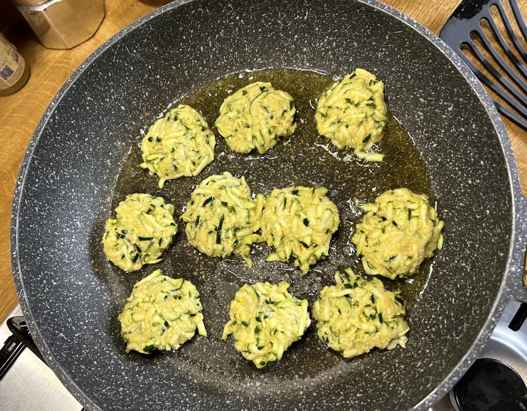 Fry courgettes