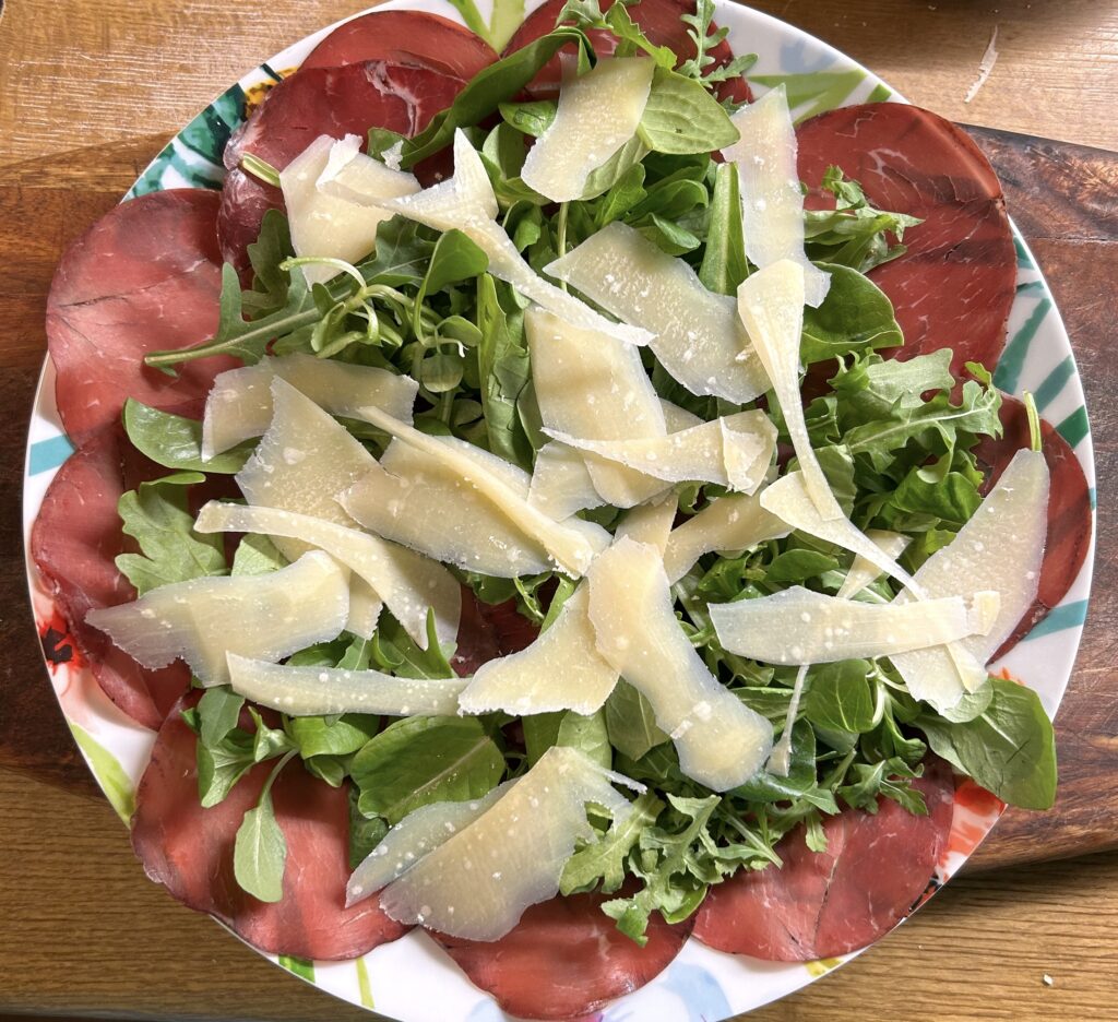 Parmesan cheese flakes + rocket + bresaola