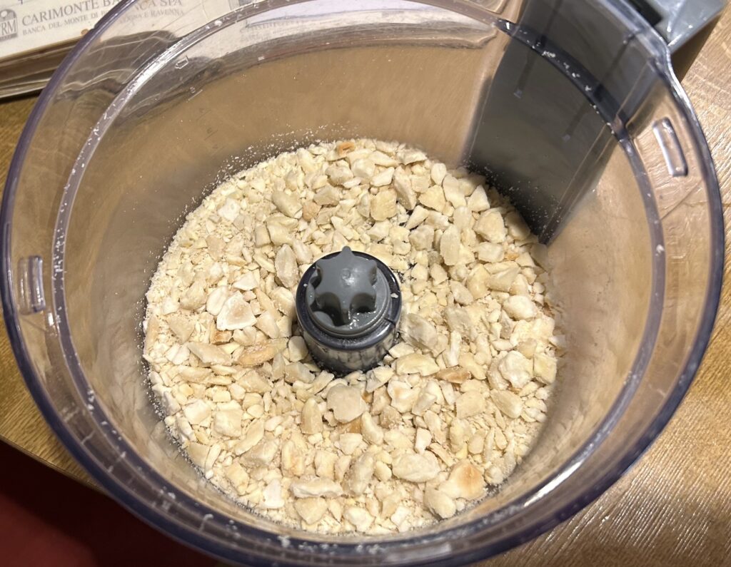 almonds in a blender and chop them