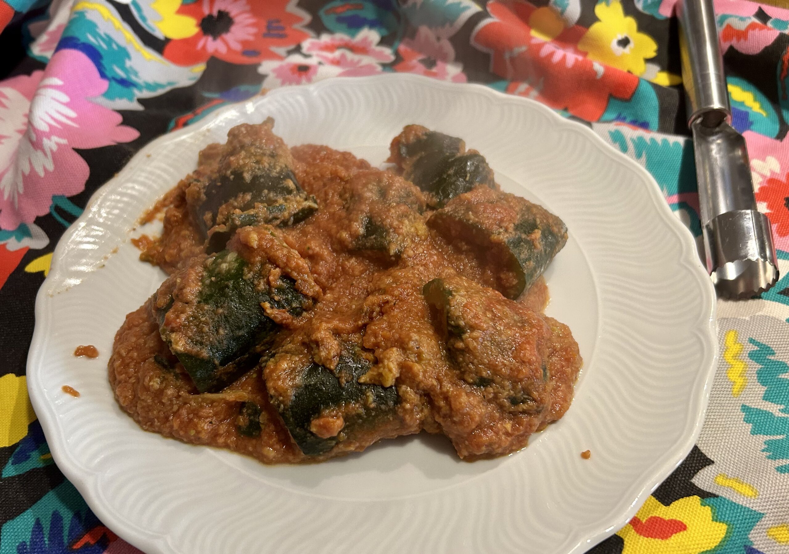 Stuffed courgettes cooked in a pan