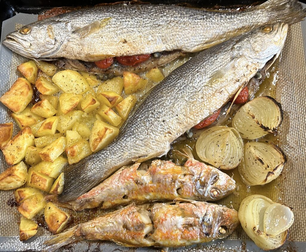 Baked croaker and red mullet and vegetables