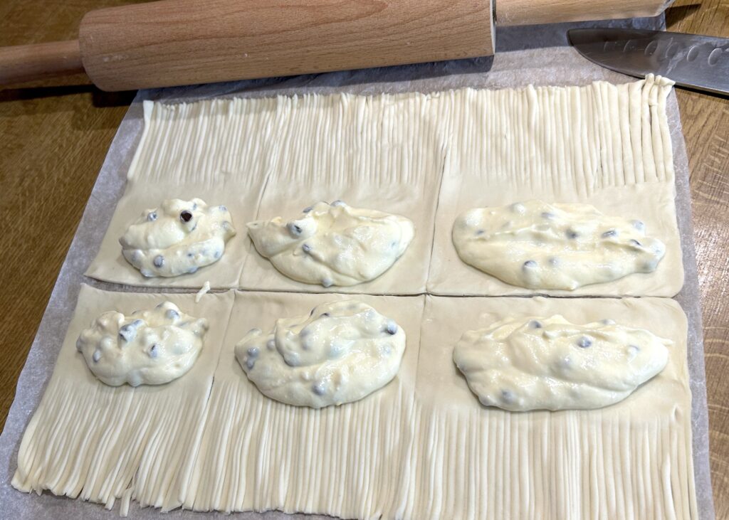 Fill the uncut halves into strips with the ricotta mixture