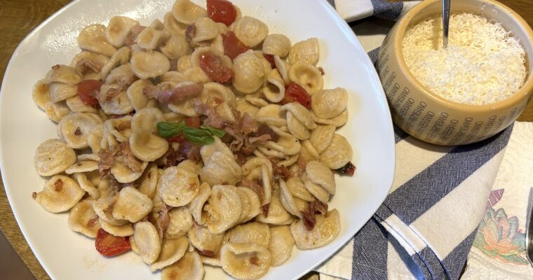 Fresh wholemeal pasta orecchiette with speck