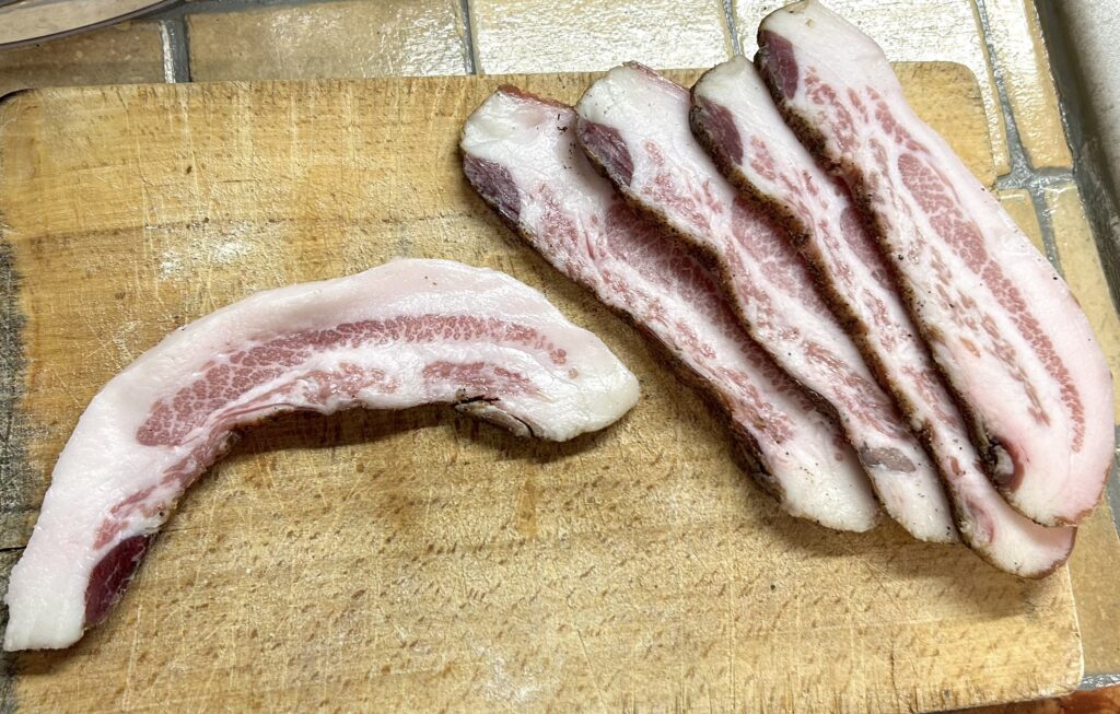 Remove the rind from the bacon