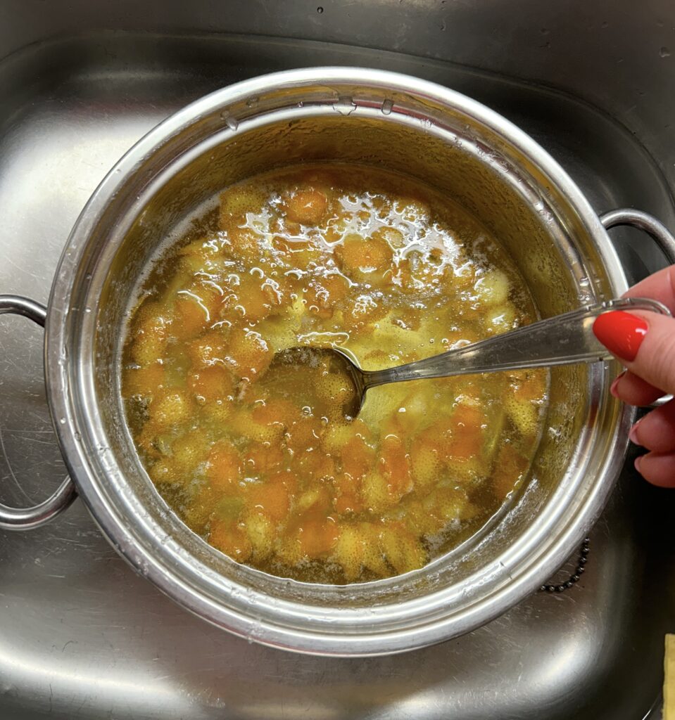 cold water with orange and peel of orange