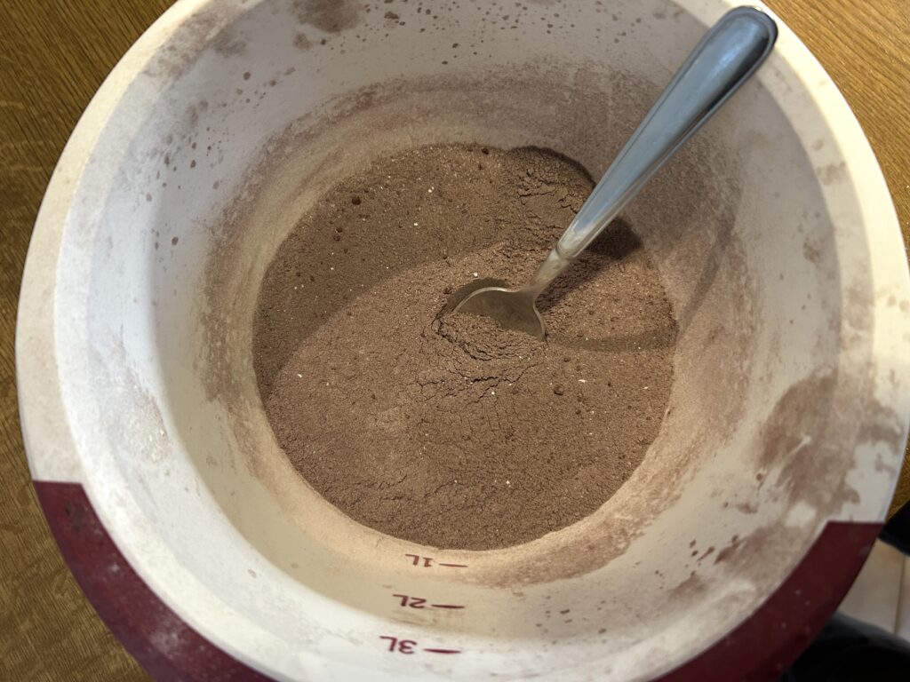 flour, sugar, bitter cocoa and yeast mix