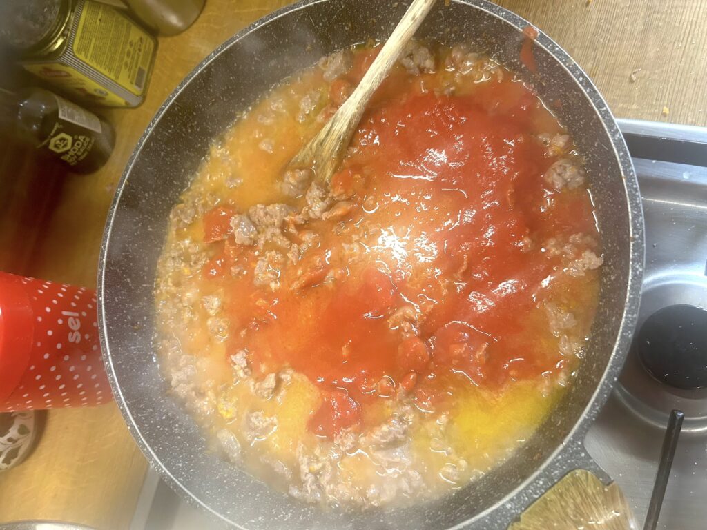 Add the tomato puree