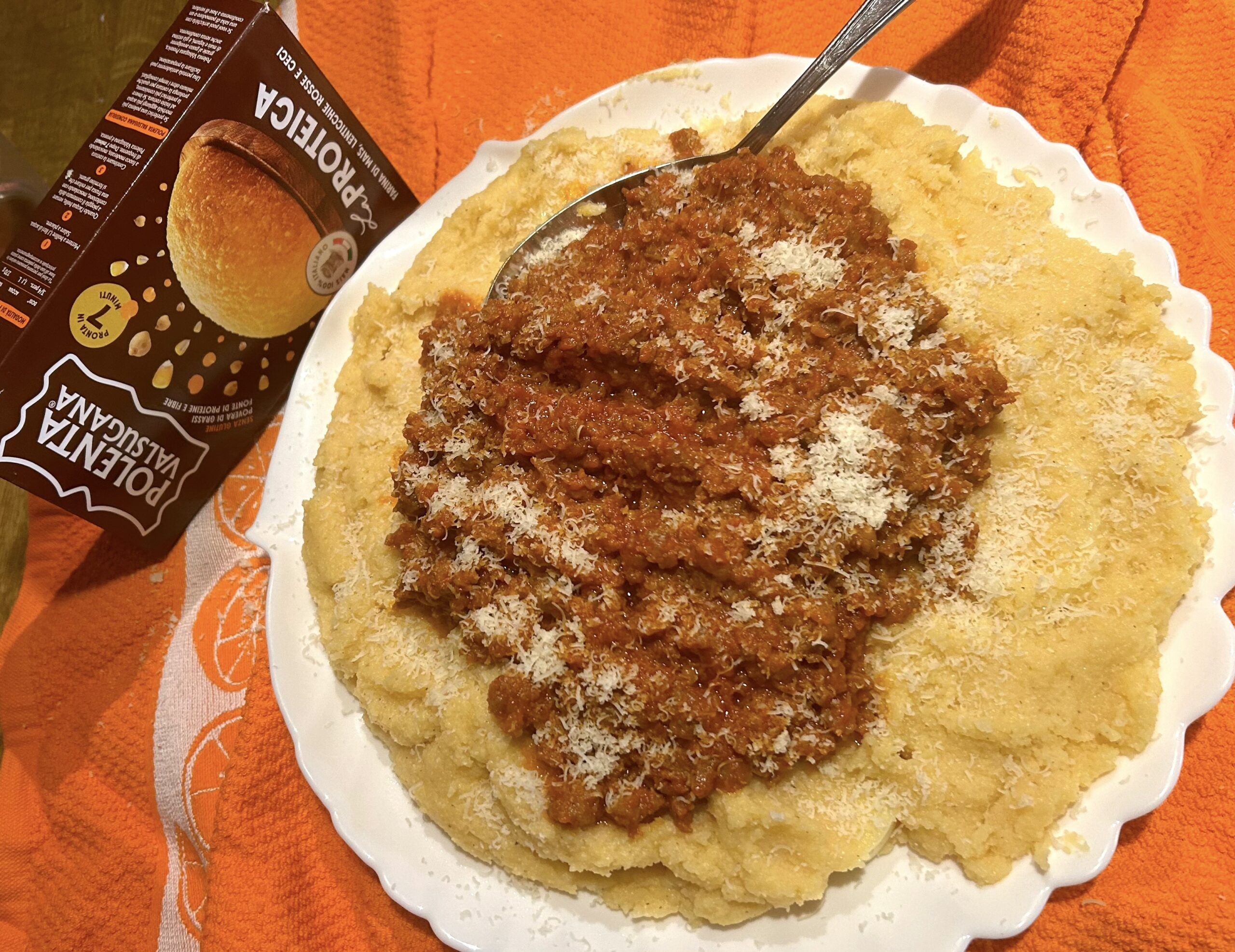 Polenta with sausage and melting cheese