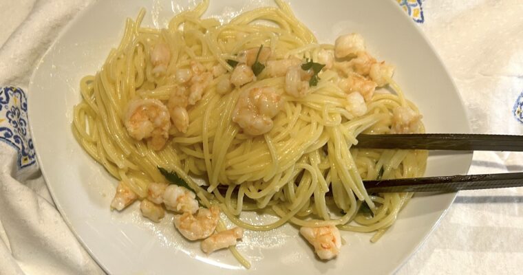 Spaghetti with garlic, oil and chili pepper with prawns