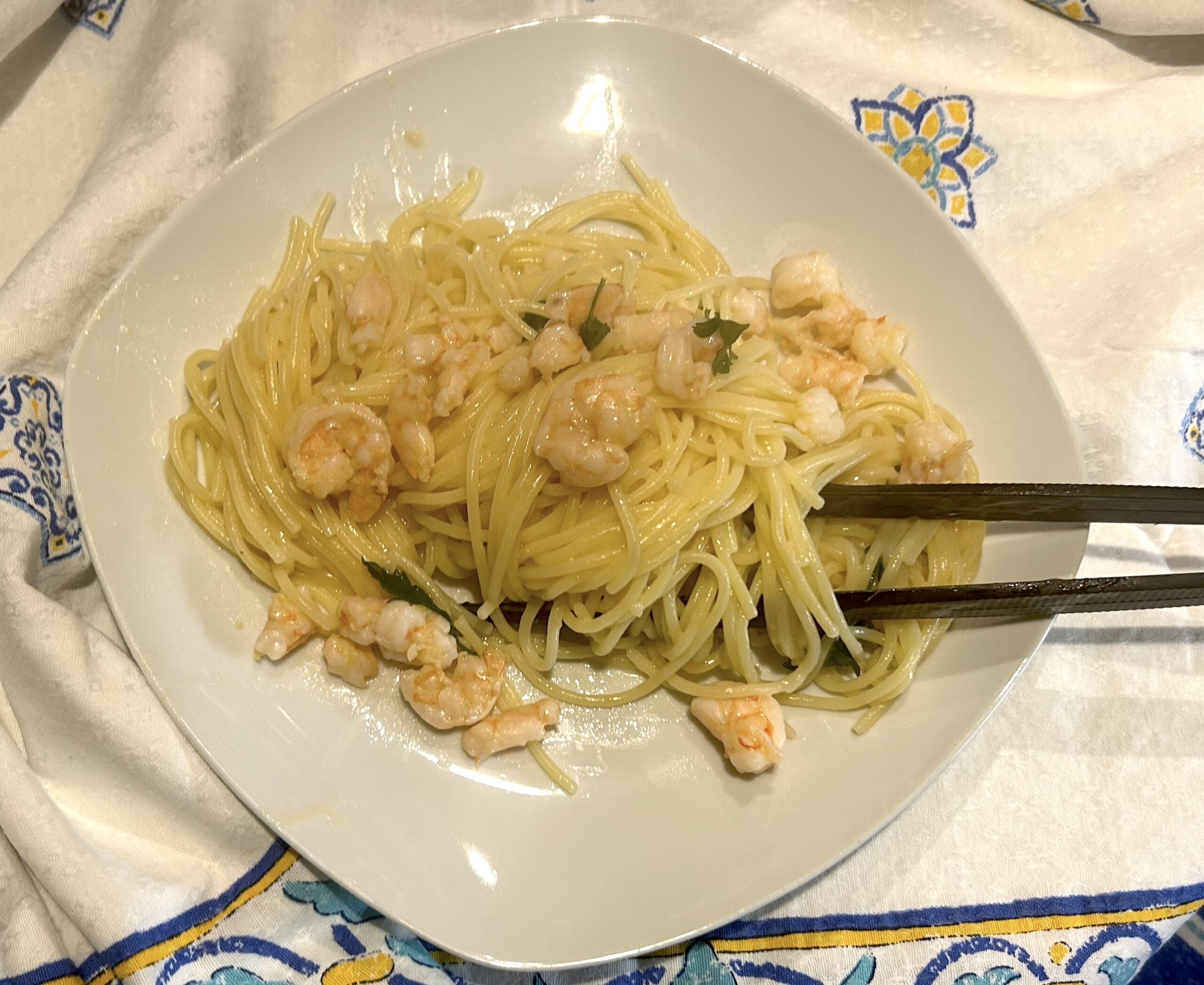 Spaghetti with garlic, oil and chili pepper with prawns