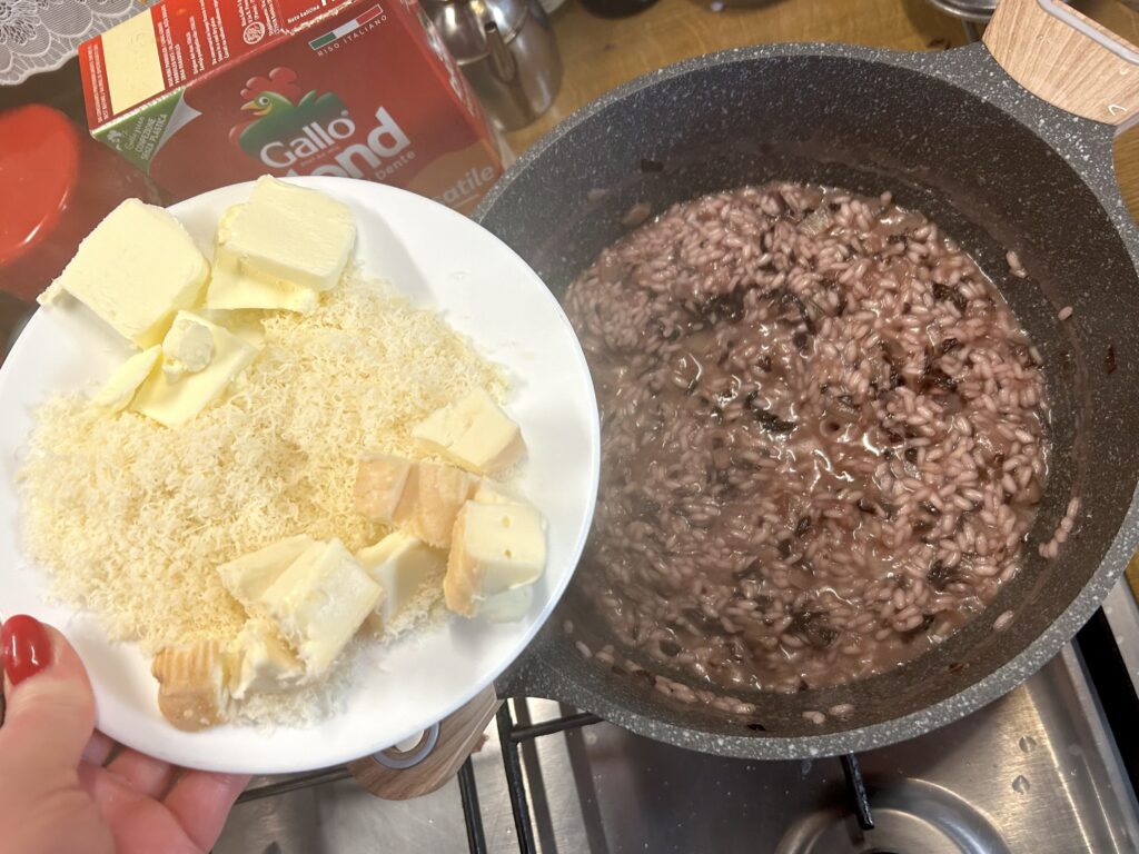 butter, taleggio and parmesan over the rice