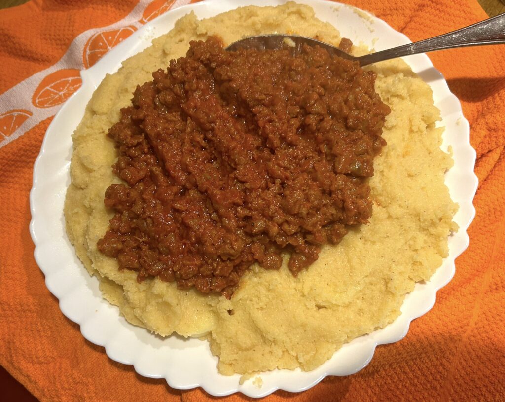 place the sausage in the center of polenta