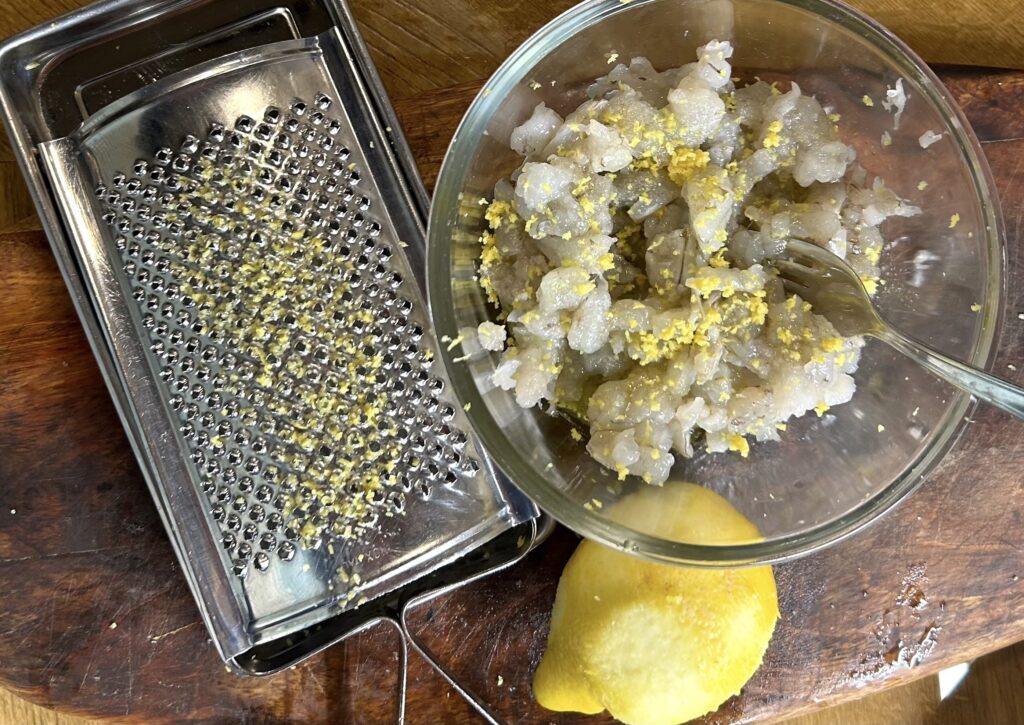 prawns cut into small pieces with extra virgin olive oil, lemon zest, a pinch of salt