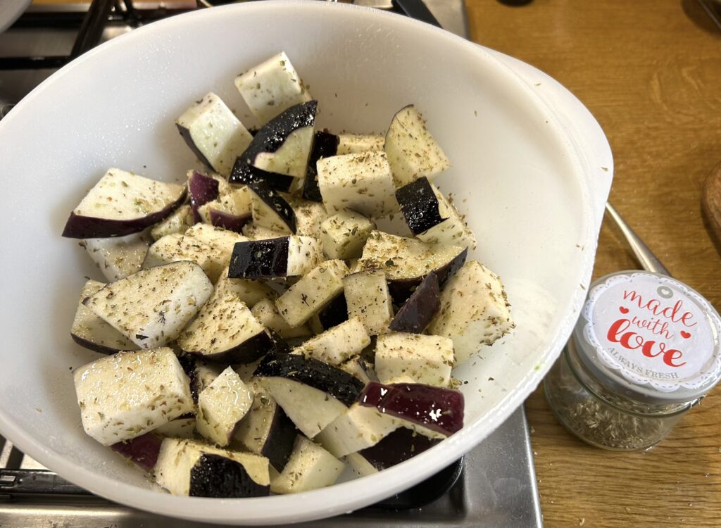 aubergine cubes oil salt, pepper and herbs