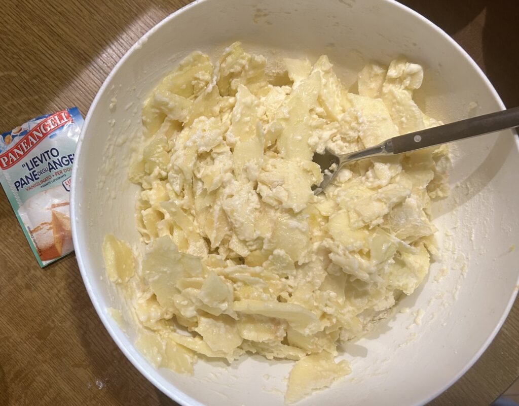 flour over the slice of apple