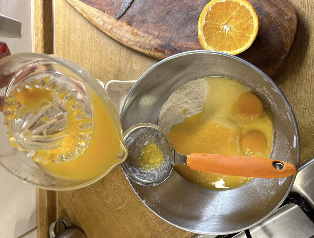 flour, sugar and eggs and orange