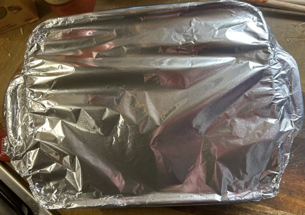 cover baking pan with foil