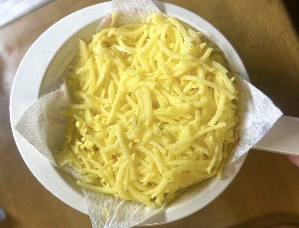 drained grated potatoes