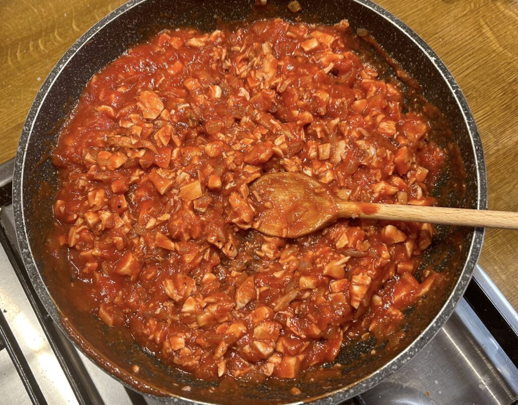 small pieces of chicken breast with tomato sauce