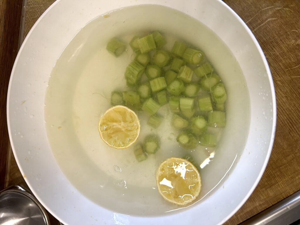 water and 2 squeezed lemons