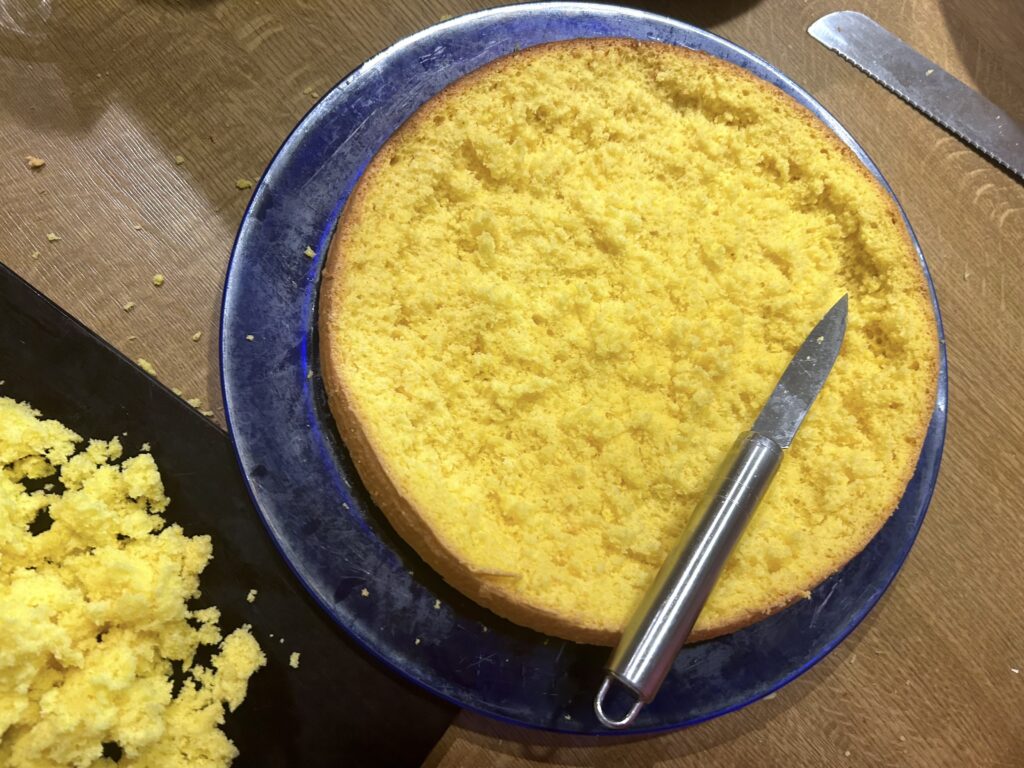 with a knife and remove a little sponge cake