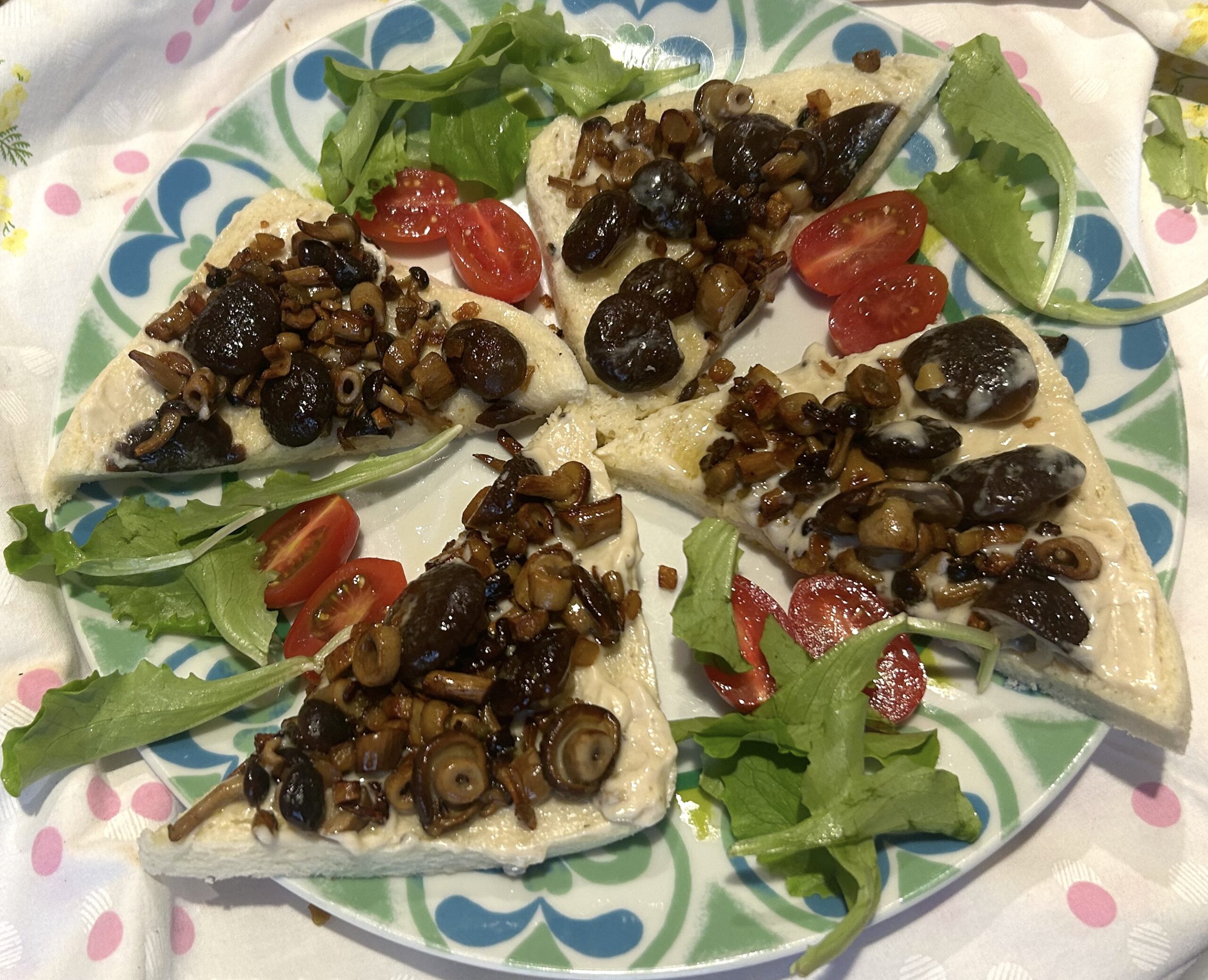 Appetizer with pioppini mushrooms and truffle sauce