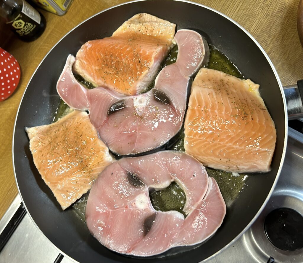 pan-fried salmon and swordfish steaks