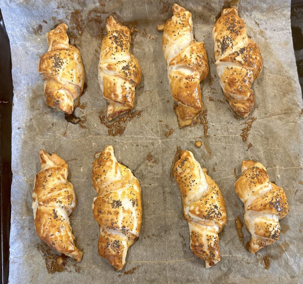 ready croissants with herb cream and salmon