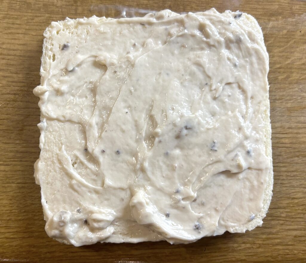 slice of bread with truffle sauce