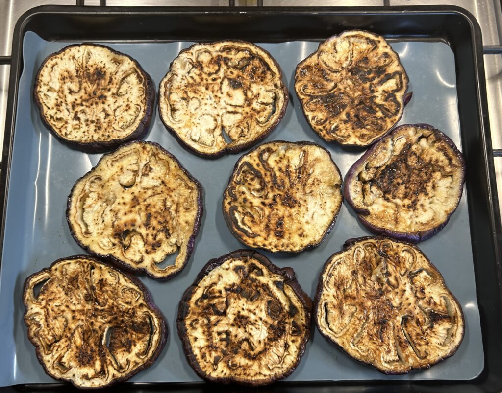 arrange the eggplants slices on a baking tray