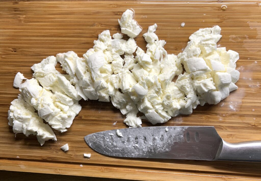 cut bufalo mozzarella into small pieces