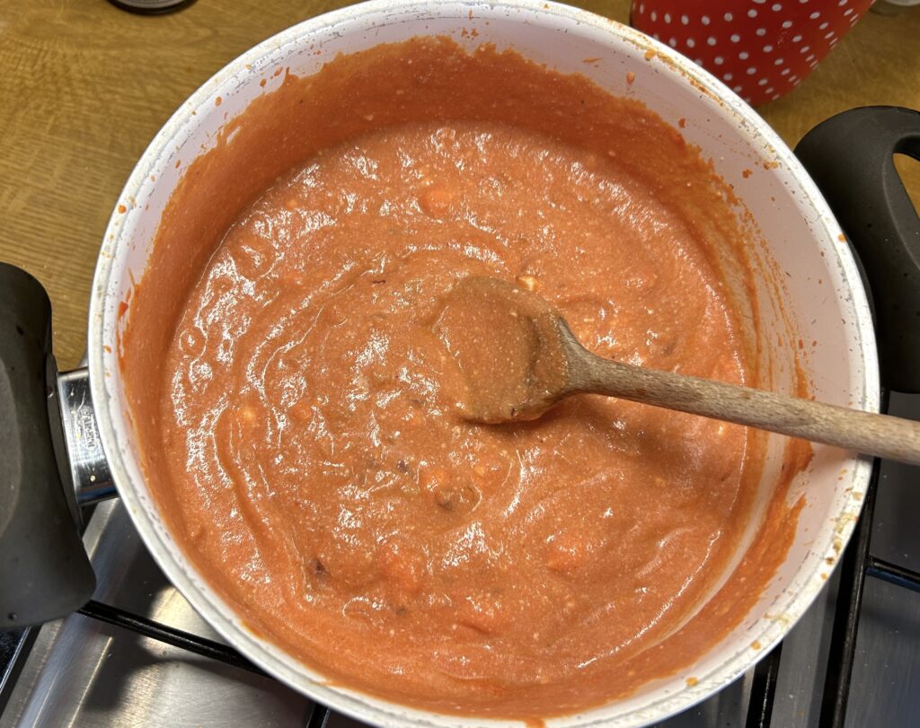 mix of tomato puree and ricotta