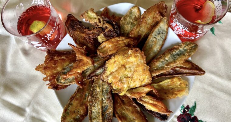 Breaded and fried sage leaves and courgette flowers