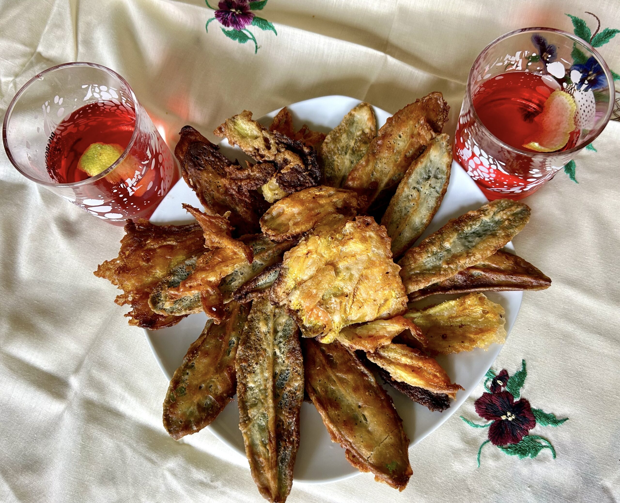 Breaded and fried sage leaves and courgette flowers