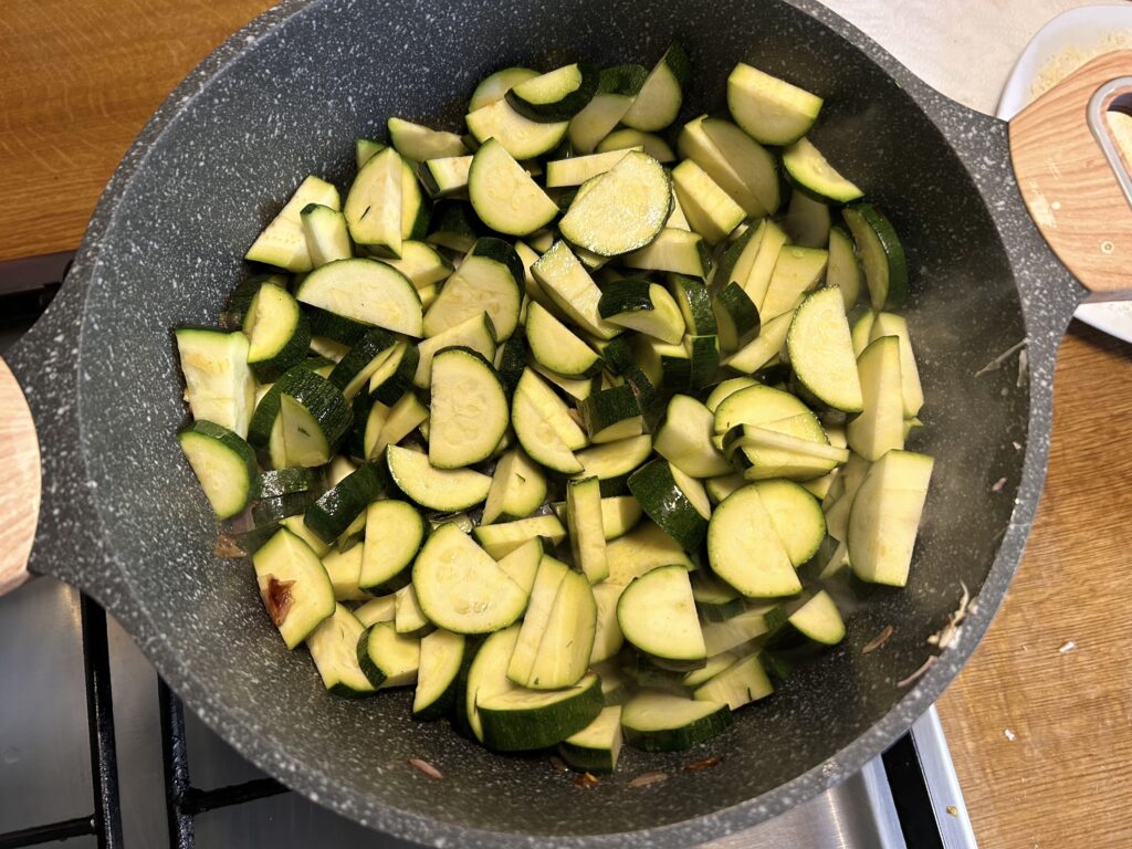 cut courgettes in half lengthwise and then into slices