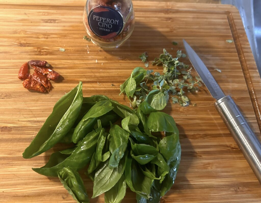 cut the basil, thyme and chilli pepper