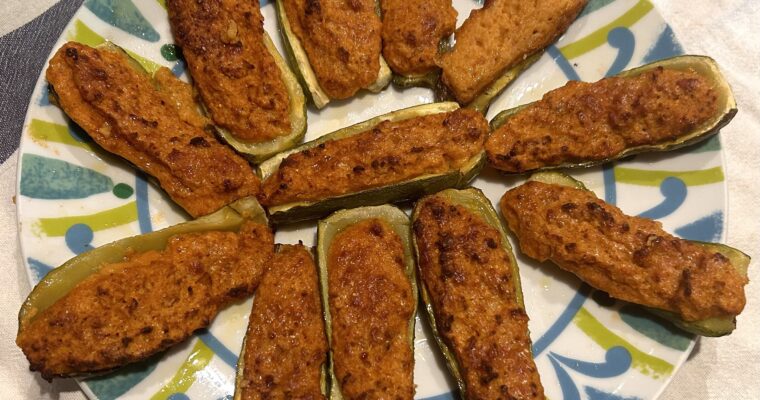 Stuffed courgettes with ragù